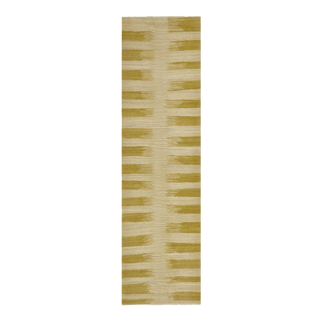 beige and yellow handwoven Afghan wool rug