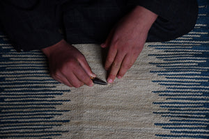 navy and creme handwoven Afghan wool runner in the making